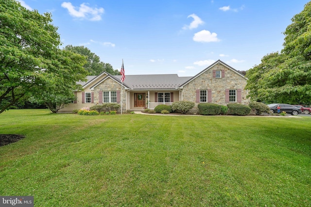 284 Little New York Rd, Rising Sun, MD 21911 - ranch-style house featuring stone siding, a front yard, a standing seam roof, and a metal roof