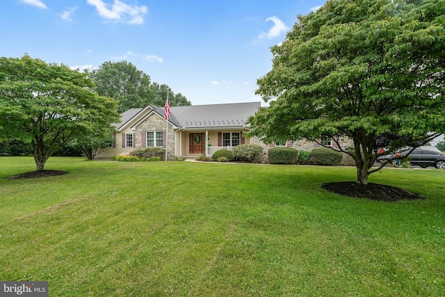 284 Little New York Rd, Rising Sun, MD 21911 - ranch-style house featuring stone siding, a front yard, a metal roof, and a porch