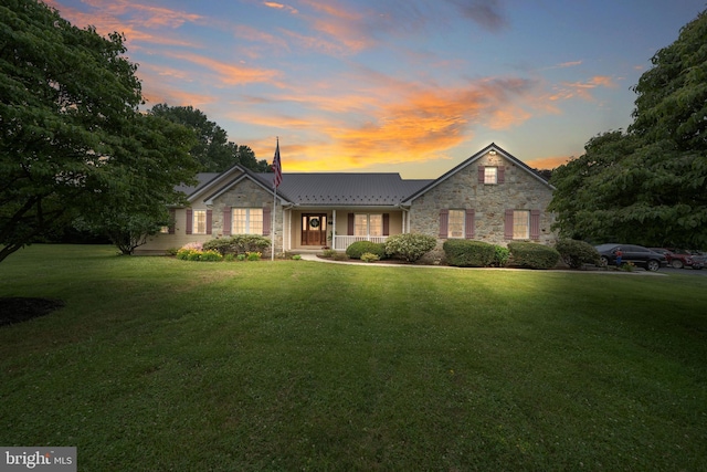 284 Little New York Rd, Rising Sun, MD 21911 - view of front facade with stone siding and a front lawn