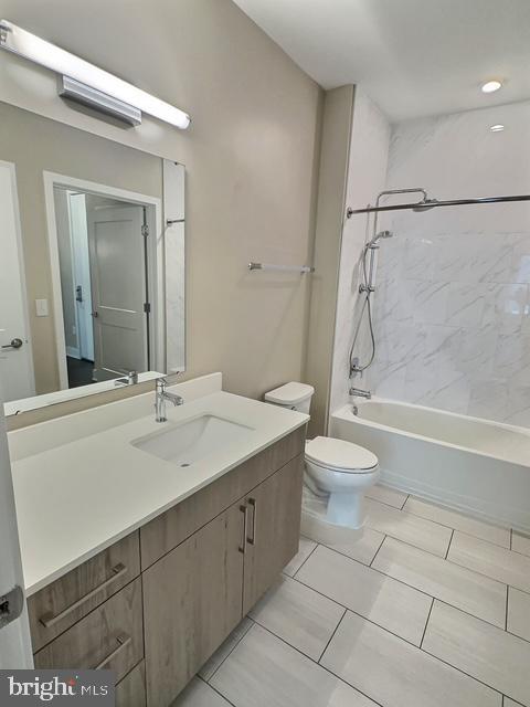 145 Riverhaven Dr Unit 254, Oxon Hill, MD 20745 - full bath featuring vanity, shower / washtub combination, and tile patterned flooring