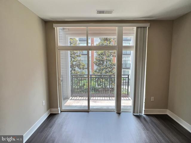145 Riverhaven Dr Unit 254, Oxon Hill, MD 20745 - entryway with dark wood finished floors