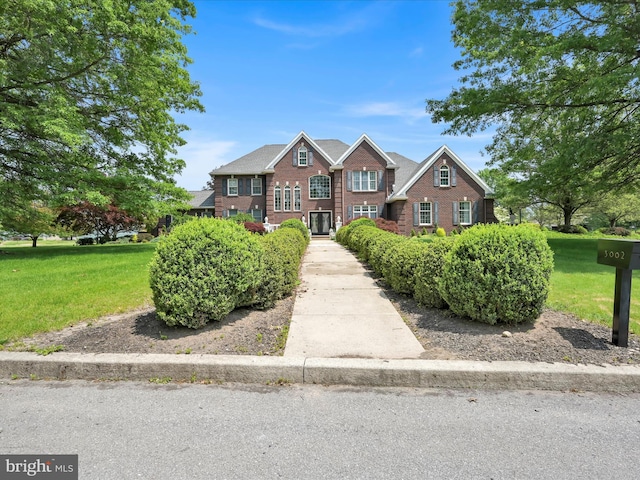 3002 Ridgeview Dr, Orwigsburg, PA 17961 - view of front of house with brick siding and a front lawn