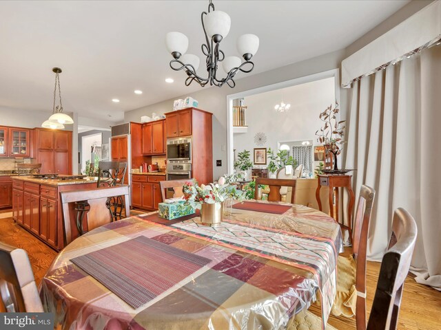 3002 Ridgeview Dr, Orwigsburg, PA 17961 - dining room with a chandelier, recessed lighting, and light wood-type flooring