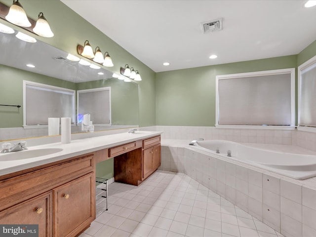 3002 Ridgeview Dr, Orwigsburg, PA 17961 - bathroom featuring double vanity, a garden tub, tile patterned floors, and recessed lighting