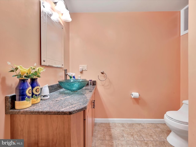 3002 Ridgeview Dr, Orwigsburg, PA 17961 - bathroom with vanity, toilet, and baseboards