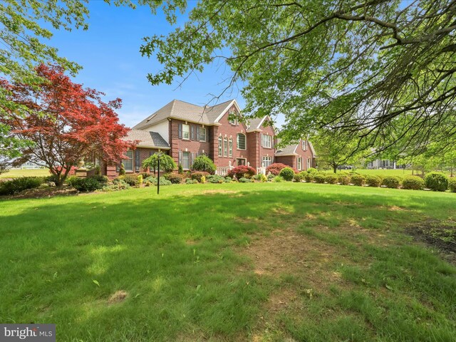 3002 Ridgeview Dr, Orwigsburg, PA 17961 - view of front of house with brick siding and a front lawn