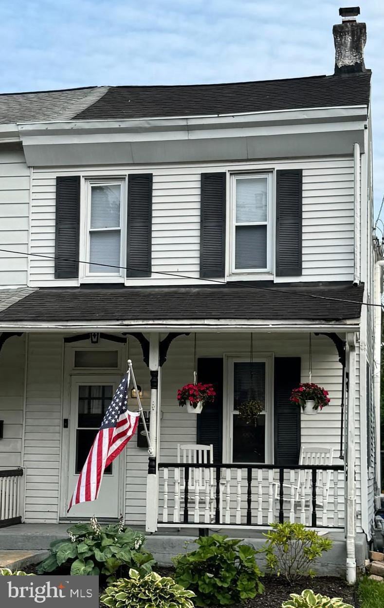 3368 Oley Turnpike Rd, Reading, PA 19606 - view of front of house with a porch, a chimney, and roof with shingles