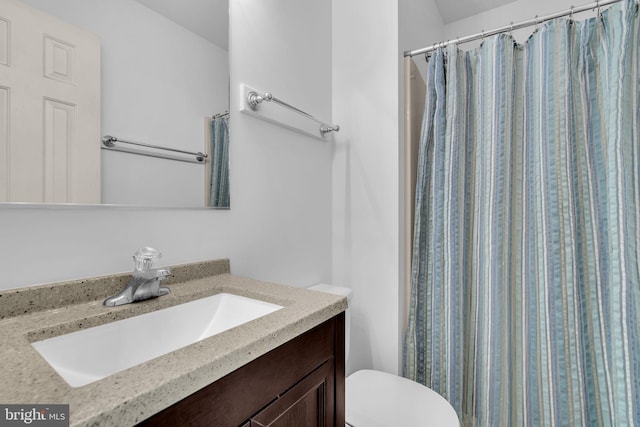38390 Golden Beach Rd, Mechanicsville, MD 20659 - full bathroom featuring vanity, toilet, and curtained shower