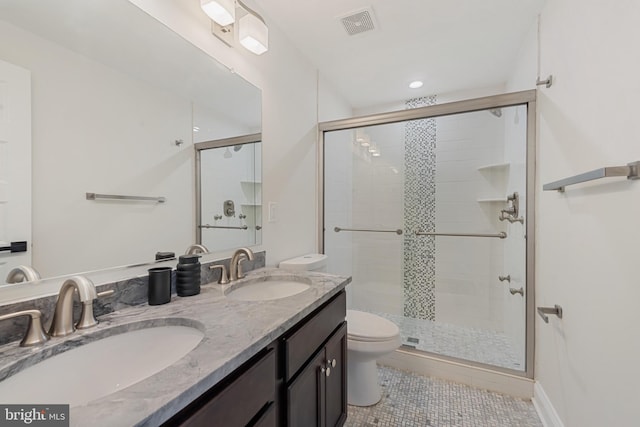 148 S E Ave, Baltimore, MD 21224 - bathroom with toilet, a stall shower, double vanity, and tile patterned floors