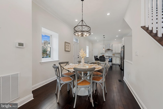 148 S E Ave, Baltimore, MD 21224 - dining area with recessed lighting, dark wood-style flooring, baseboards, a chandelier, and ornamental molding
