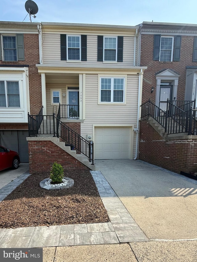 7093 Gresham Ct W, Frederick, MD 21703 - multi unit property with an attached garage and driveway