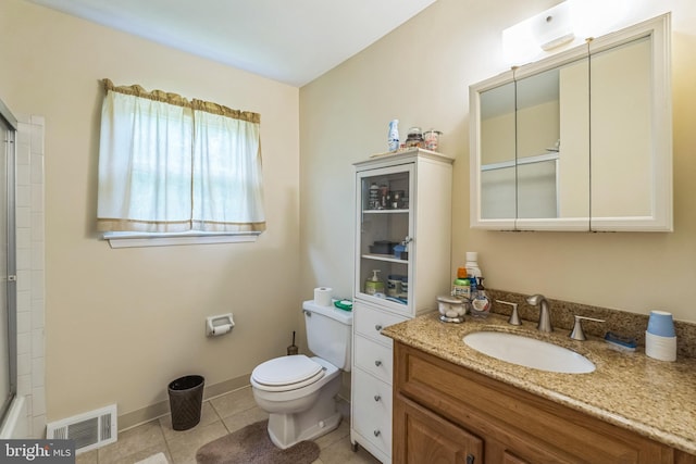 148 Belmont Dr, Upper Chichester, PA 19061 - full bathroom featuring toilet, vanity, tile patterned flooring, an enclosed shower, and baseboards