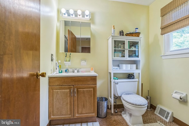 148 Belmont Dr, Upper Chichester, PA 19061 - bathroom featuring toilet, vanity, baseboards, and tile patterned flooring