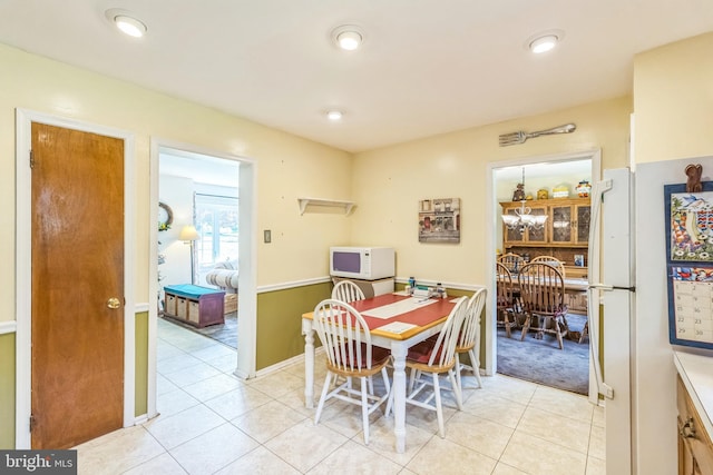 148 Belmont Dr, Upper Chichester, PA 19061 - dining area with light tile patterned floors