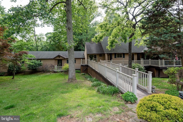 26747 Cat Creek Rd, Mechanicsville, MD 20659 - view of front of house with a front lawn, roof with shingles, and a wooden deck