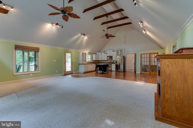 26747 Cat Creek Rd, Mechanicsville, MD 20659 - unfurnished living room featuring a ceiling fan, carpet floors, high vaulted ceiling, track lighting, and plenty of natural light