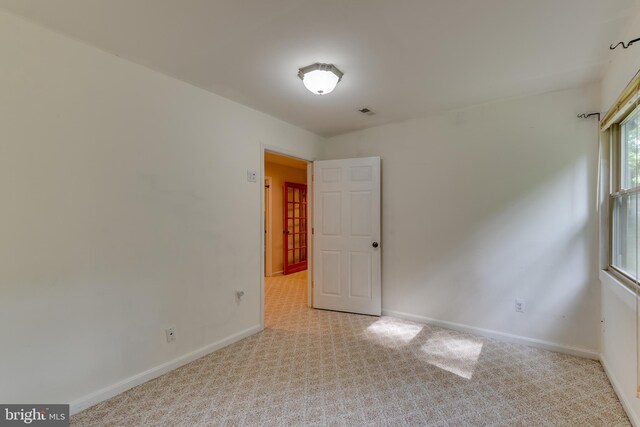 26747 Cat Creek Rd, Mechanicsville, MD 20659 - carpeted spare room with baseboards