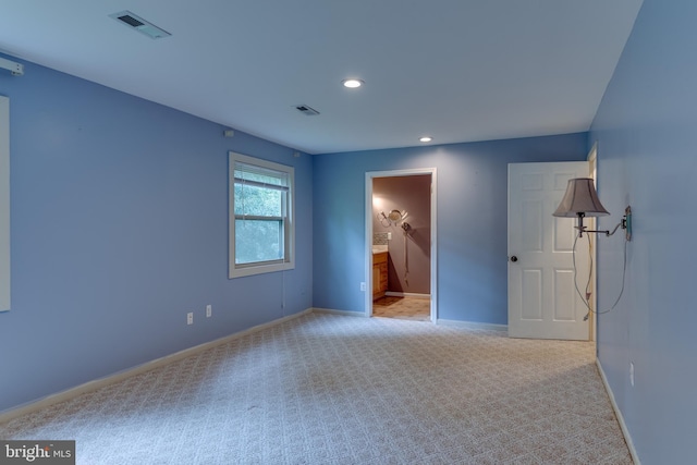 26747 Cat Creek Rd, Mechanicsville, MD 20659 - empty room with light carpet, baseboards, and recessed lighting