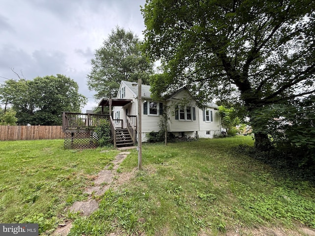 3602 Tulip Ave, Baltimore, MD 21227 - back of house with a deck and stairs