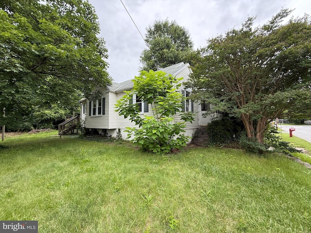 3602 Tulip Ave, Baltimore, MD 21227 - view of property exterior featuring a yard