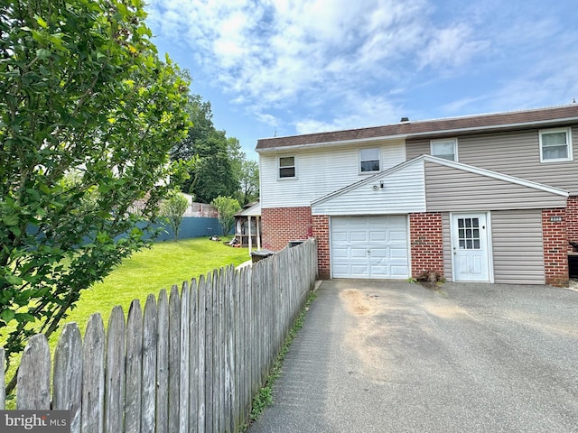 807 Rabbit Ln, Reading, PA 19606 - view of home's exterior with asphalt driveway and brick siding