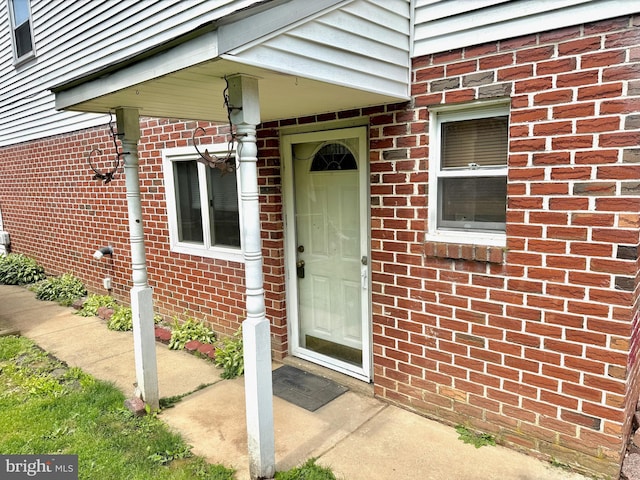 807 Rabbit Ln, Reading, PA 19606 - doorway to property with brick siding