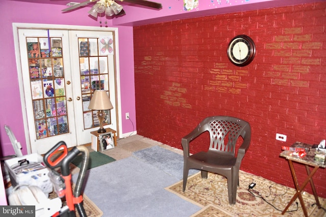 807 Rabbit Ln, Reading, PA 19606 - home office with a ceiling fan, french doors, and brick wall