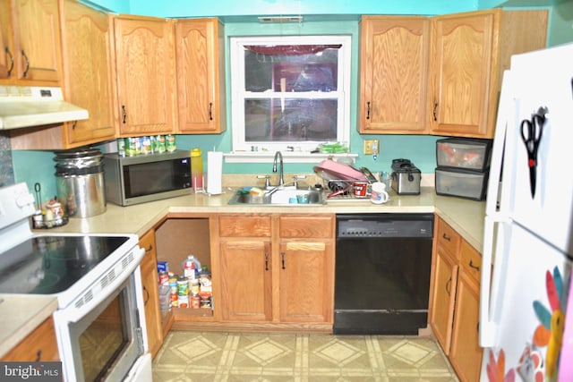 807 Rabbit Ln, Reading, PA 19606 - kitchen with white appliances, ventilation hood, a sink, and light countertops