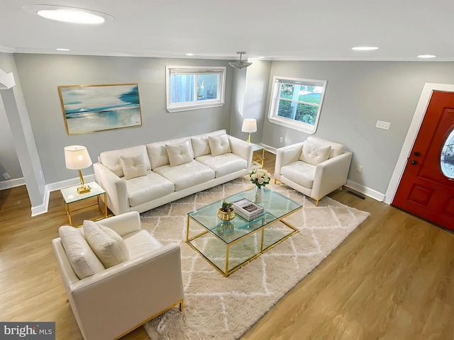 1507 E Duval St, Philadelphia, PA 19138 - living area with baseboards, wood finished floors, crown molding, and recessed lighting