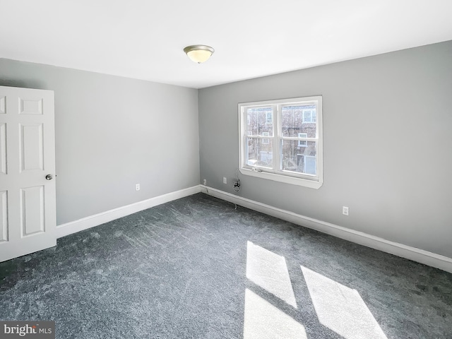 1507 E Duval St, Philadelphia, PA 19138 - unfurnished room featuring dark carpet and baseboards