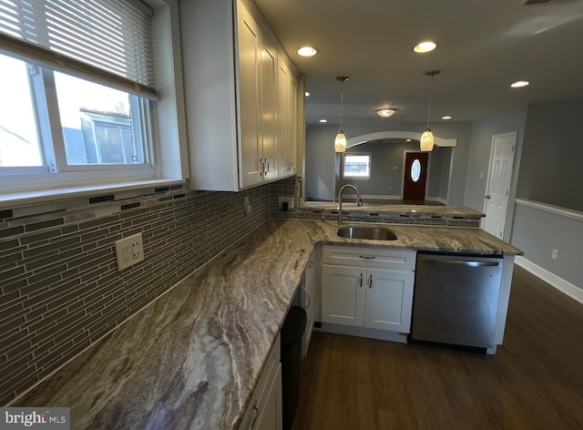 1507 E Duval St, Philadelphia, PA 19138 - kitchen with stainless steel dishwasher, a sink, a peninsula, dark wood-style flooring, and recessed lighting