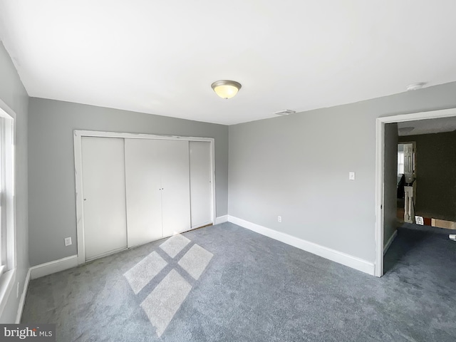 1507 E Duval St, Philadelphia, PA 19138 - unfurnished bedroom with carpet floors, baseboards, and a closet