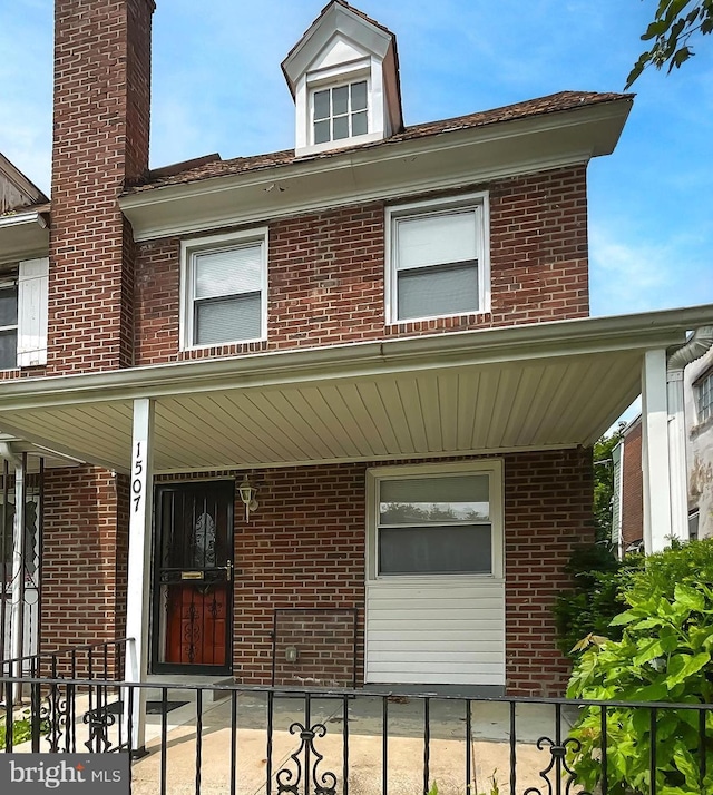1507 E Duval St, Philadelphia, PA 19138 - view of front of property with brick siding and a chimney