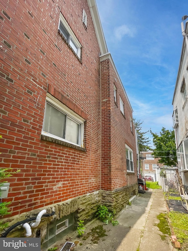 1507 E Duval St, Philadelphia, PA 19138 - view of side of home featuring brick siding