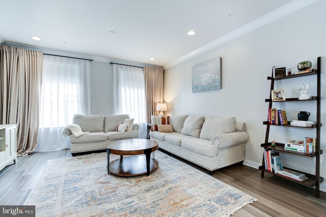 3409 Stone Barn Dr, Frederick, MD 21704 - living room featuring ornamental molding, wood finished floors, recessed lighting, and baseboards