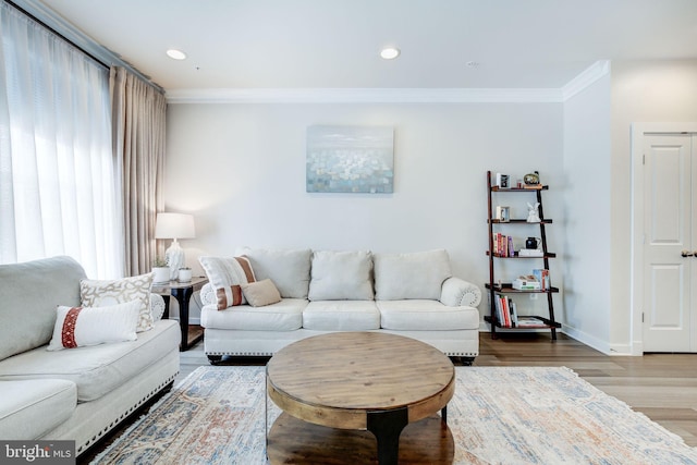 3409 Stone Barn Dr, Frederick, MD 21704 - living area featuring crown molding, wood finished floors, baseboards, and recessed lighting