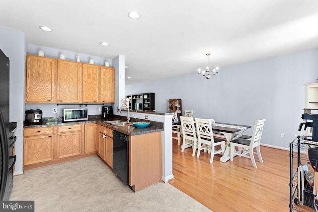 15673 Mendoza Ln, Woodbridge, VA 22191 - kitchen featuring black dishwasher, a peninsula, stainless steel microwave, a chandelier, and recessed lighting
