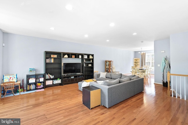 15673 Mendoza Ln, Woodbridge, VA 22191 - living room with light wood-style floors, recessed lighting, and a chandelier