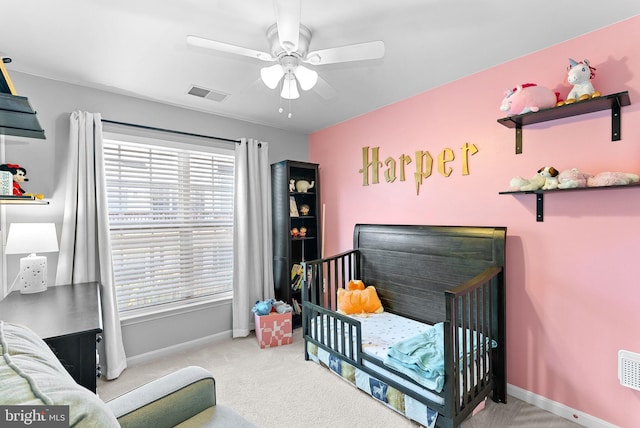 15673 Mendoza Ln, Woodbridge, VA 22191 - carpeted bedroom with a crib and ceiling fan