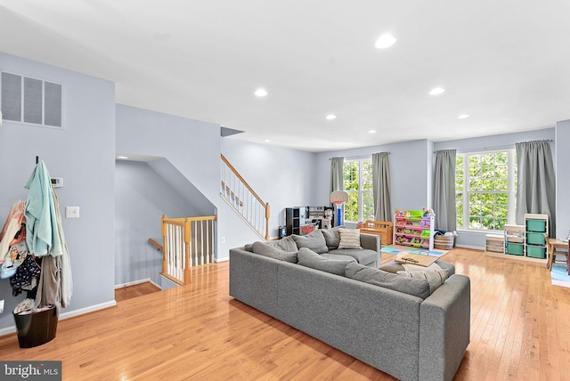 15673 Mendoza Ln, Woodbridge, VA 22191 - living room with light wood-style flooring and recessed lighting
