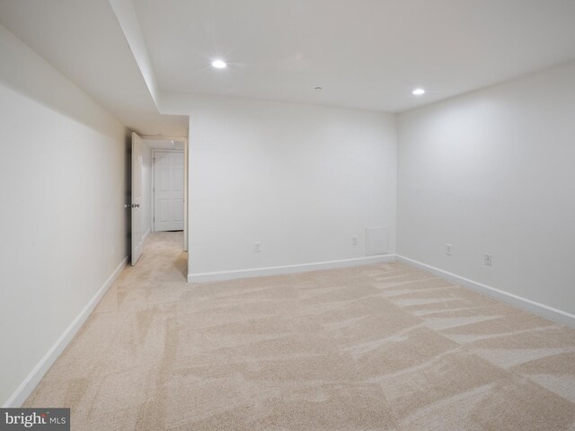 1705 E Chase St, Baltimore, MD 21213 - unfurnished room featuring light colored carpet, recessed lighting, and baseboards