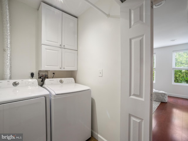 1705 E Chase St, Baltimore, MD 21213 - laundry area with cabinet space, independent washer and dryer, baseboards, and dark wood-style floors