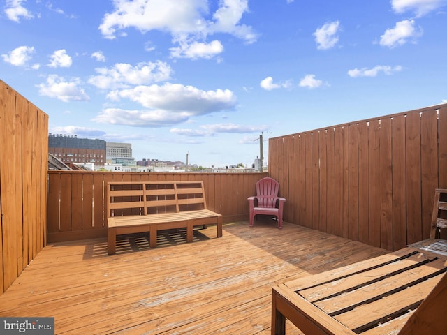 1705 E Chase St, Baltimore, MD 21213 - wooden terrace with a city view