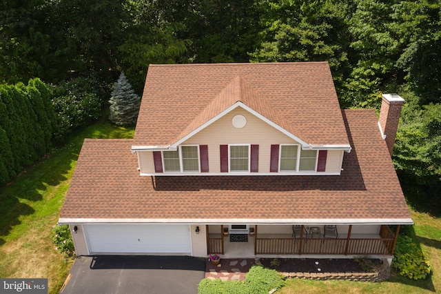 14 Saint Josephs Way, Schuylkill Haven, PA 17972 - view of front of house with asphalt driveway, a chimney, covered porch, and a shingled roof