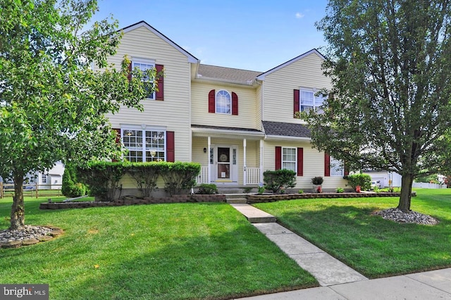 14 Riverside Rd, Dover, DE 19904 - traditional-style home featuring a front yard and a porch