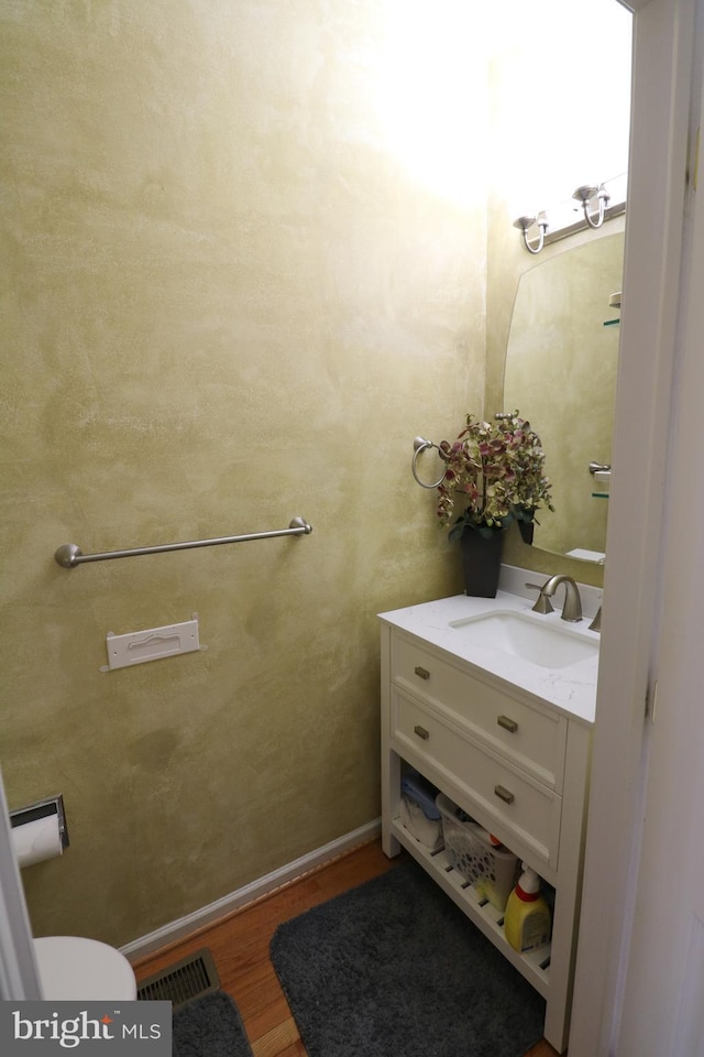 14 Riverside Rd, Dover, DE 19904 - bathroom with vanity and wood finished floors
