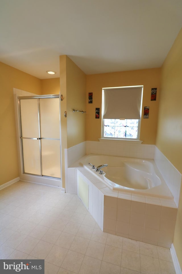 14 Riverside Rd, Dover, DE 19904 - bathroom featuring a bath, a shower stall, and tile patterned flooring