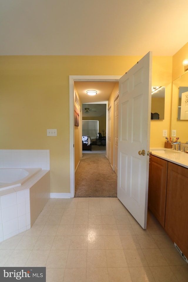 14 Riverside Rd, Dover, DE 19904 - bathroom featuring vanity and tiled tub