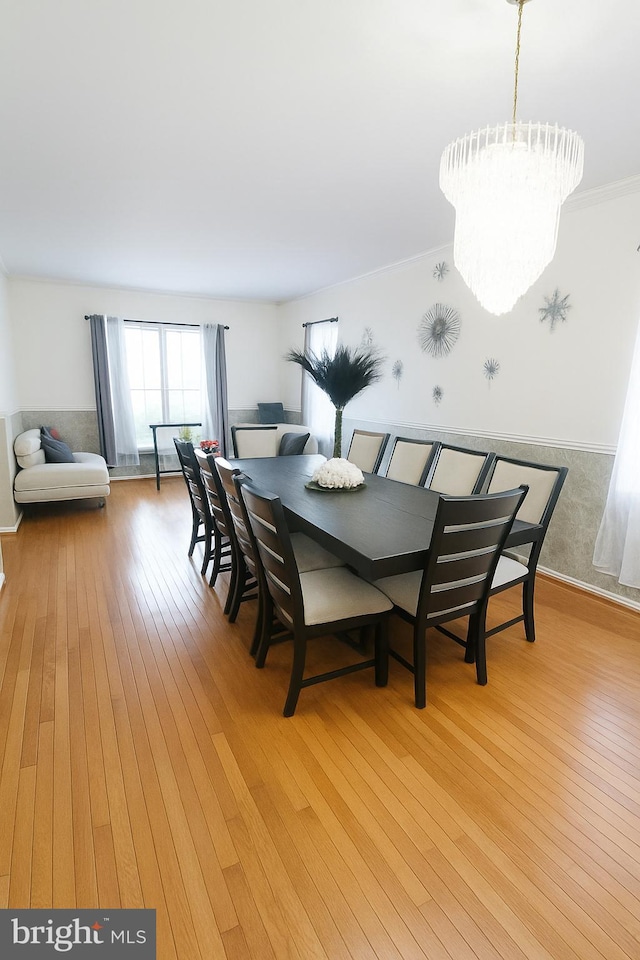 14 Riverside Rd, Dover, DE 19904 - dining area with light wood-type flooring and a chandelier