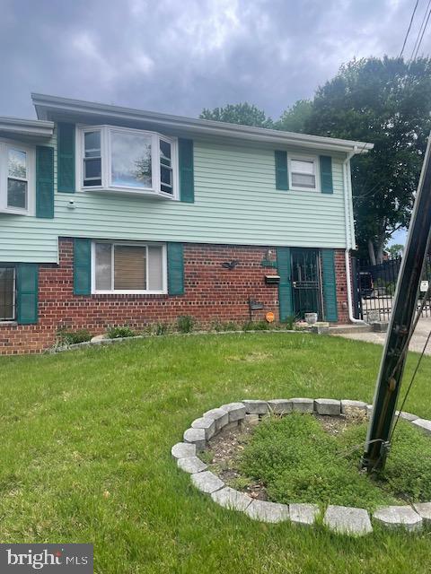 2206 Olson Ct, Temple Hills, MD 20748 - view of front of house featuring brick siding